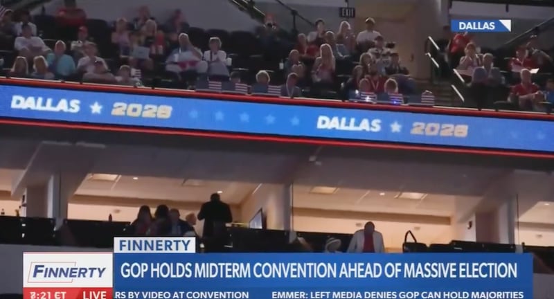Newsmax show empty seats as Mike Johnson said the venue was packed to the rafters.