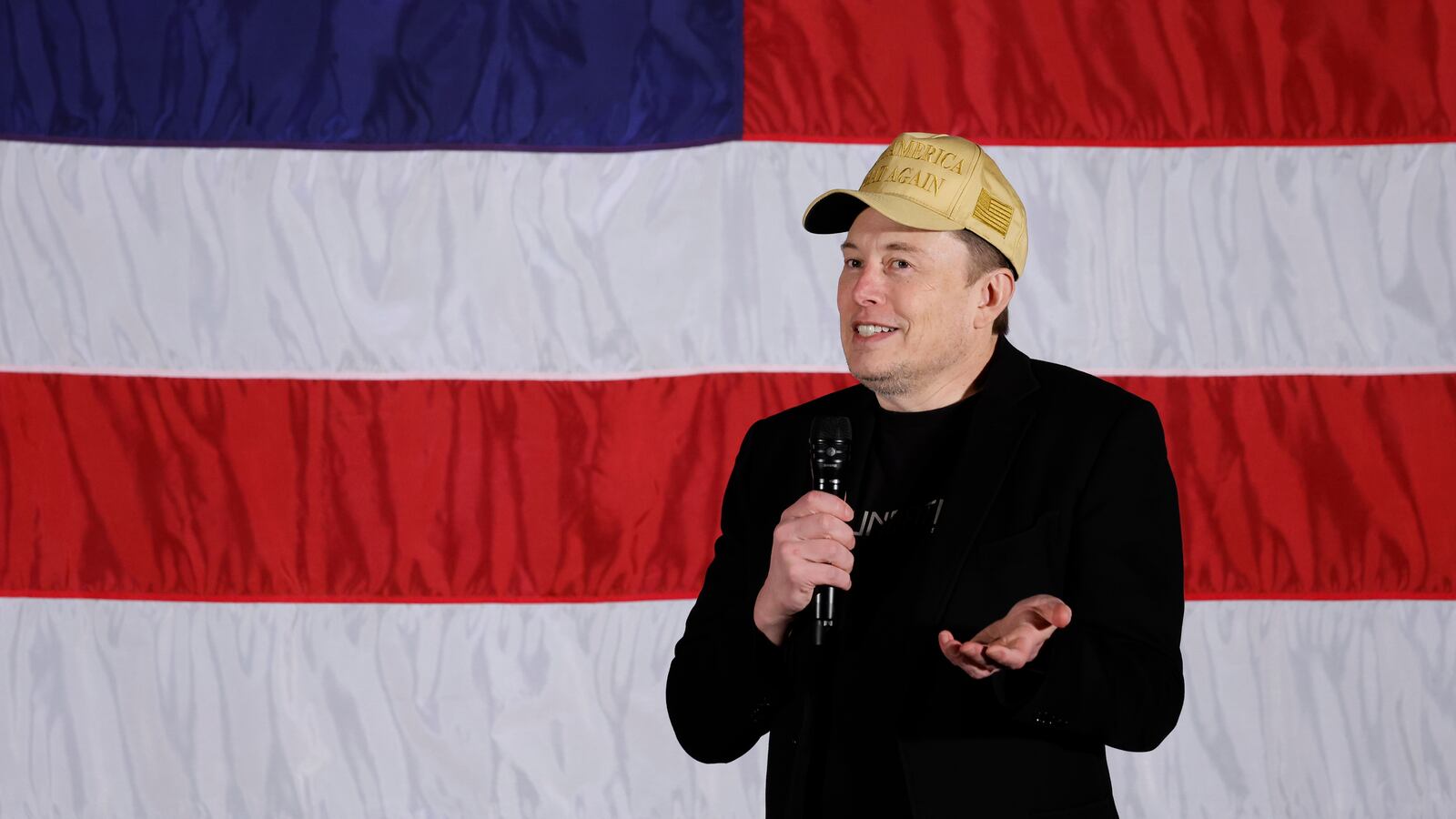 FOLSOM, PENNSYLVANIA - OCTOBER 17: SpaceX and Tesla founder Elon Musk participates in a town hall-style meeting to promote early and absentee voting at Ridley High School on October 17, 2024 in Folsom, Pennsylvania.