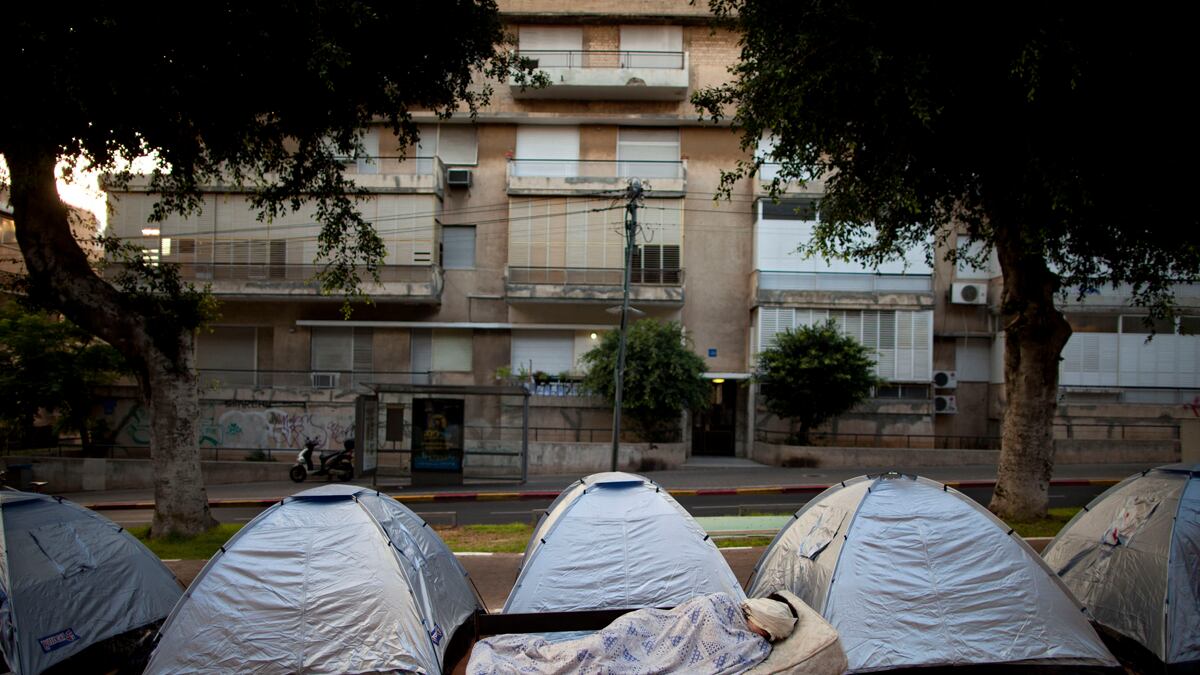 articles/2011/07/28/israelis-protest-inflation-and-high-prices-in-tel-aviv/israel-protests-ephron_aofdnw