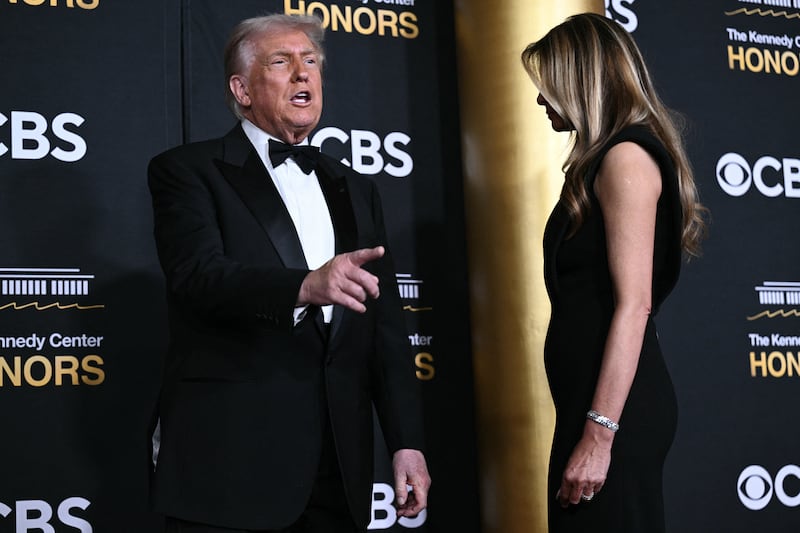 US President Donald Trump and First Lady Melania Trump arrive for the 48th Kennedy Center Honors gala at the Kennedy Center in Washington, DC, on December 7, 2025.