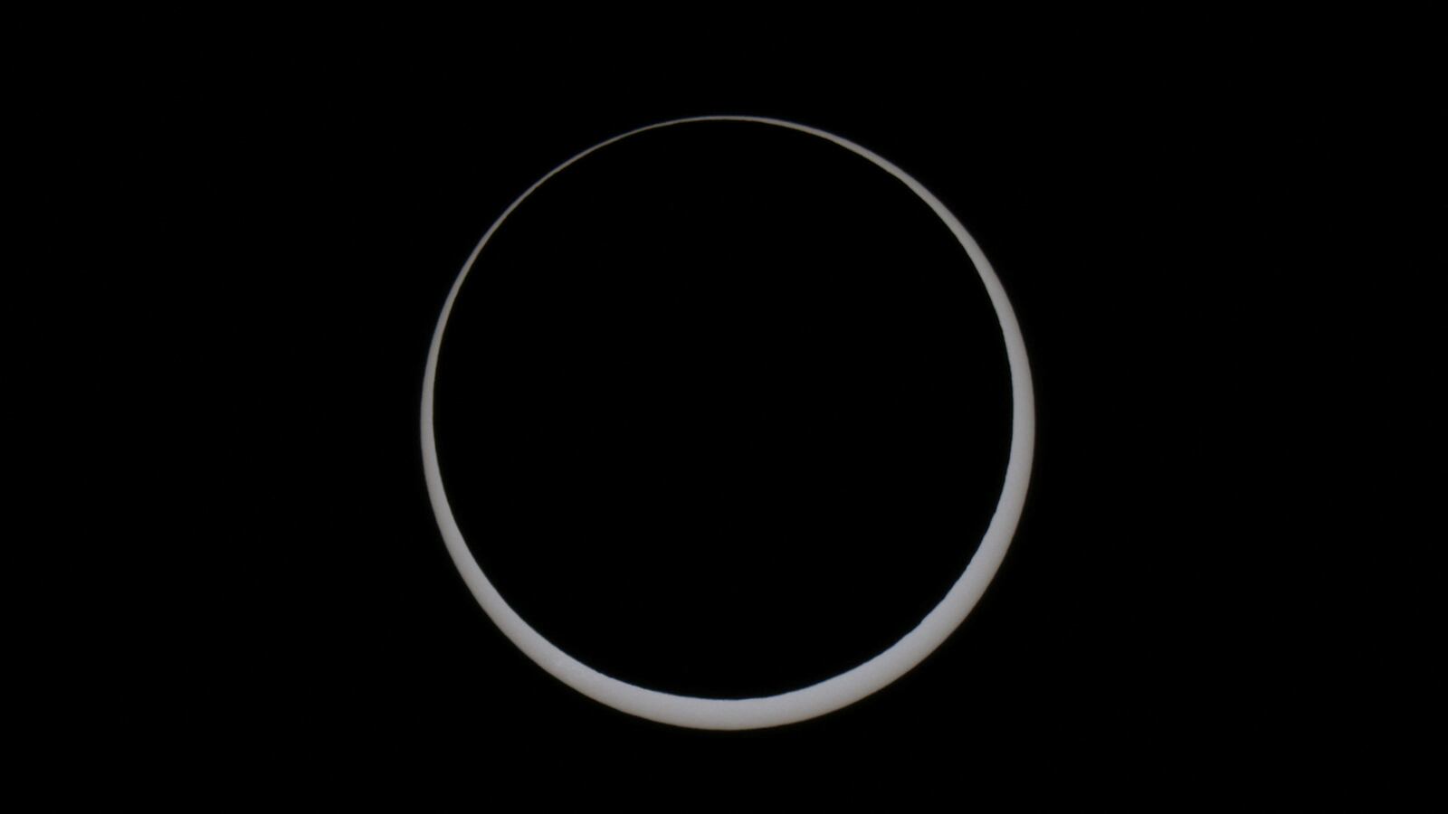 An annular eclipse seen in a photo taken Oct. 14, 2023. The moon obscures the sun, except for the outer edge, creating what looks like a “ring of fire” in the sky.