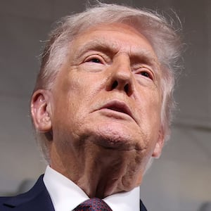 WASHINGTON, DC - JANUARY 29: U.S. President Donald Trump and first lady Melania Trump speak to reporters as they attend a screening of the documentary film “Melania” at The Kennedy Center on January 29, 2026 in Washington, DC. “Melania” was directed by Brett Ratner, and Amazon paid $40 million to license the film, which follows the first lady in the twenty days before her return to the White House. (Photo by Samuel Corum/Getty Images)