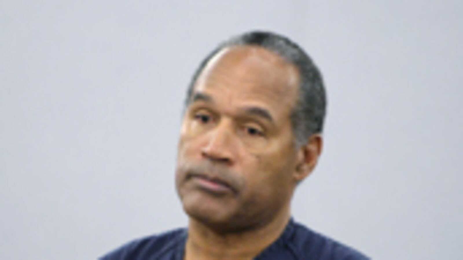 articles/2008/12/06/farewell-oj/crouch-oj-simpson_6860_z3tbxg
