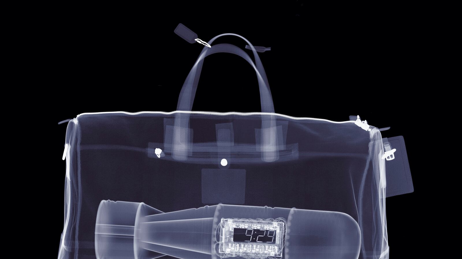 articles/2013/12/03/pentagon-tells-workers-to-ask-before-bringing-bombs-to-work/131202-siegel-pentagon-bomb-tease_eqauee