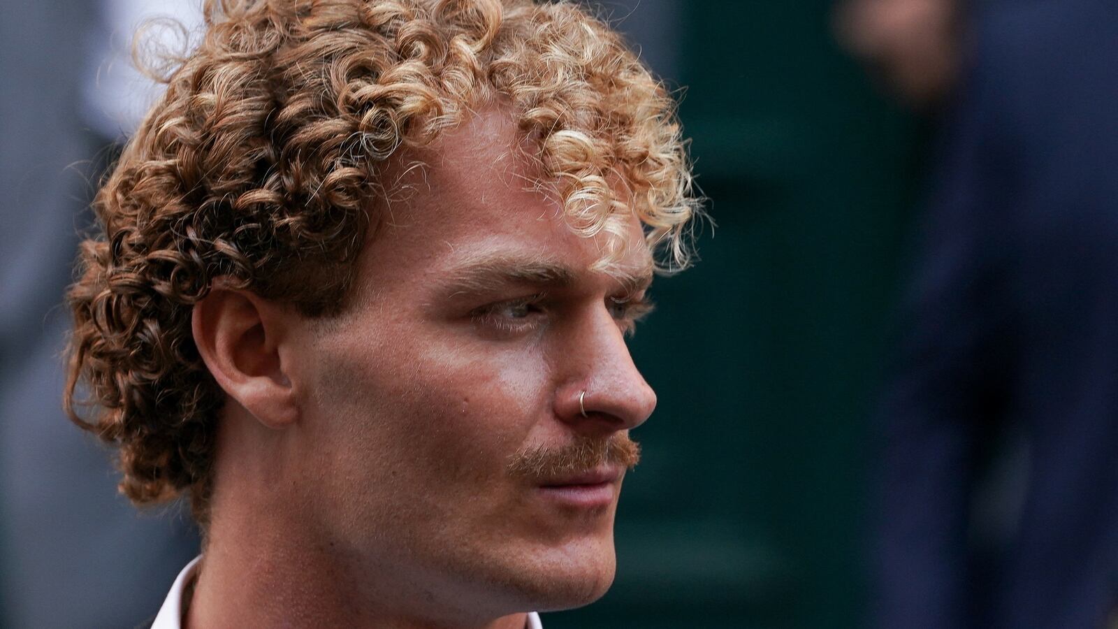 Former U.S. Marine Daniel Penny looks on as he is taken from a New York City Police precinct under arrest for the death of Jordan Neely.