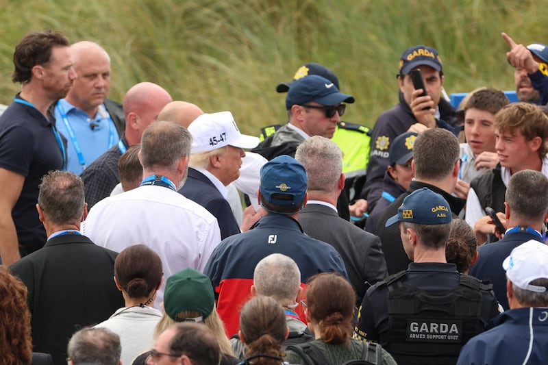 U.S. President Donald Trump walks during the Amgen Irish Open 2026, at Trump International Golf Links in Doonbeg, County Clare, Ireland, September 13, 2026. REUTERS/Cathal McNaughton