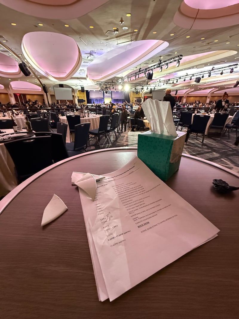 Paper and a broken plate on a table