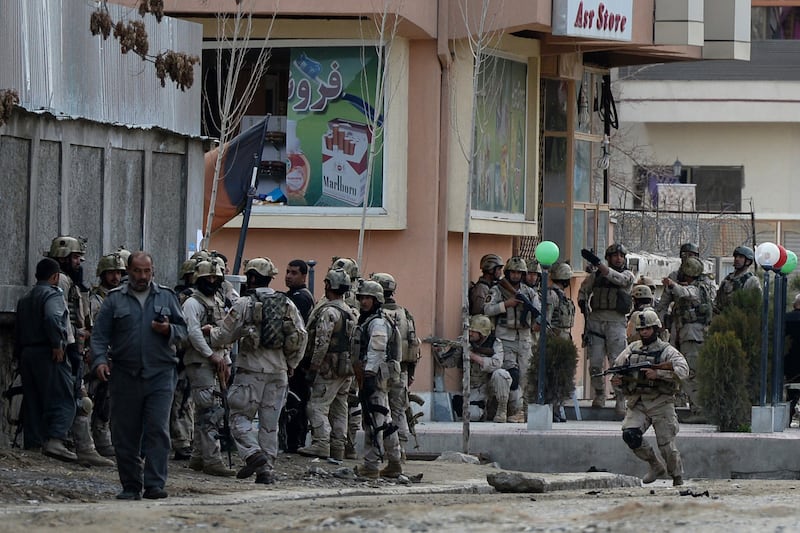 galleries/2014/03/28/taliban-attacks-guest-house-in-kabul-photos/140328-kabul-attack6_lavaj6