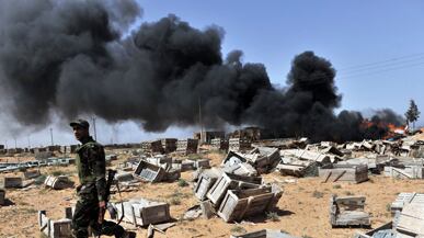 cheats/2011/04/01/rebels-would-accept-ceasefire/libya-rebels-hit-wall_rdvr44