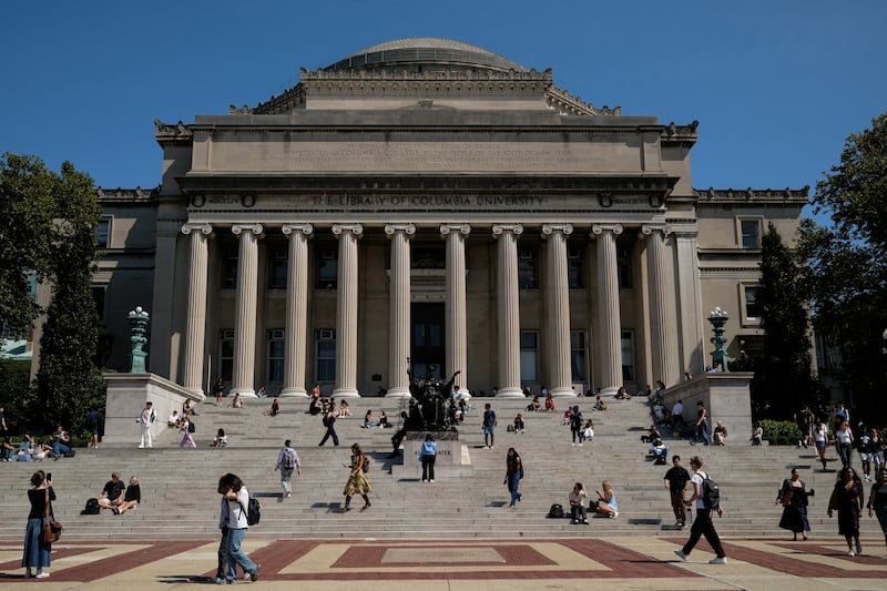 People walk through Columbia University in New York City, U.S.