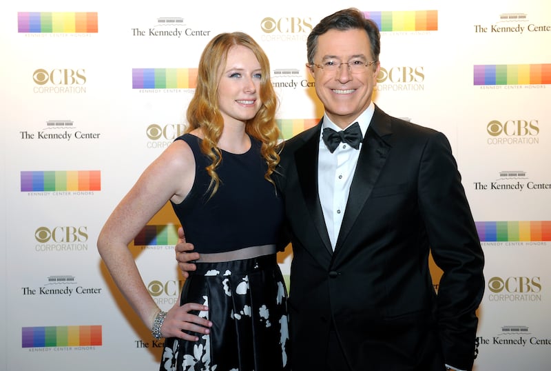 Stephen Colbert and his daughter, Madeleine, walk the red carpet before the Kennedy Center Honors December 06, 2015 in Washington, DC.
