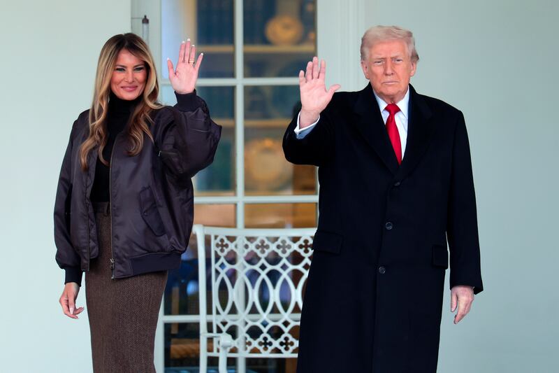 First lady Melania Trump and U.S. President Donald Trump arrive for the 78th annual National Thanksgiving Turkey Presentation