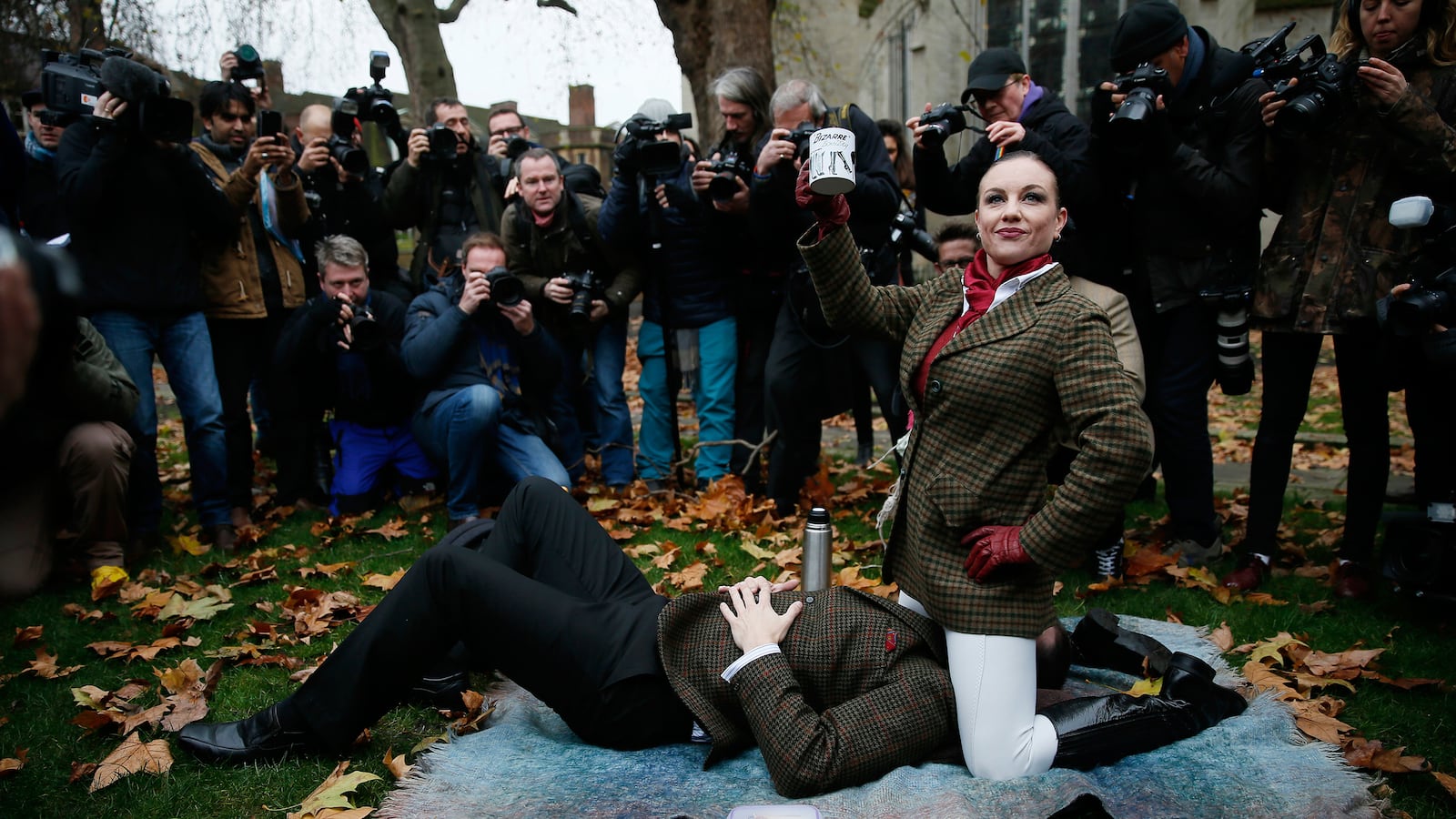 articles/2014/12/12/britain-s-record-breaking-face-sitting-porn-protest/141207-hines-london-protest-tease_cjyuvl