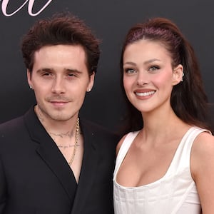 Former British model Brooklyn Beckham (L) and wife US actress Nicola Peltz Beckham arrive for the premiere of the movie "Lola" at the Bruin Theatre, in Los Angeles, California on February 3, 2024. (Photo by LISA O'CONNOR / AFP) (Photo by LISA O'CONNOR/AFP via Getty Images)