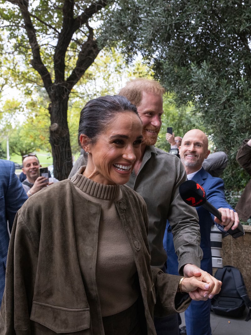 MELBOURNE, AUSTRALIA - 2026/04/14: Prince Harry, Duke of Sussex and Meghan Markle, Duchess of Sussex seen arriving at Australian National Veterans Arts Museum. Prince Harry, Duke of Sussex, and Meghan, Duchess of Sussex, arrive at the Australian National Veterans Arts Museum in Melbourne, Australia, where they were greeted by a large media presence. (Photo by Josh Stanyer/SOPA Images/LightRocket via Getty Images)