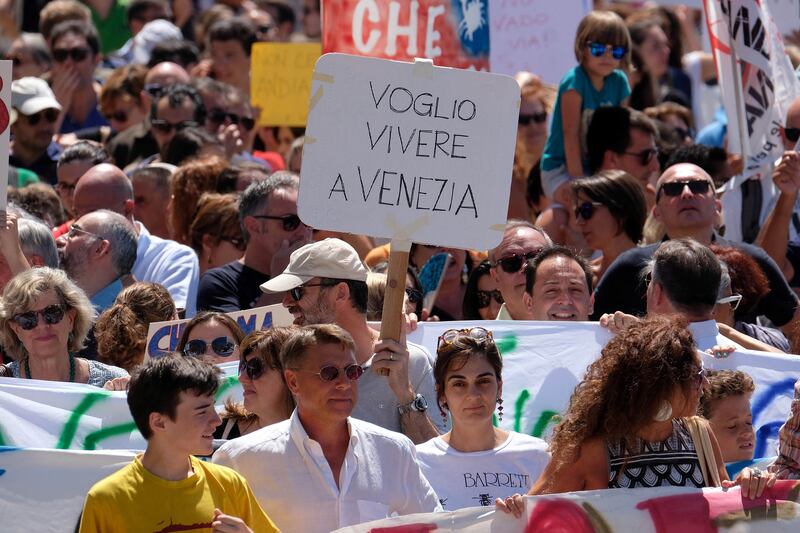 Residents protest the increase in tourism in Venice, Italy.