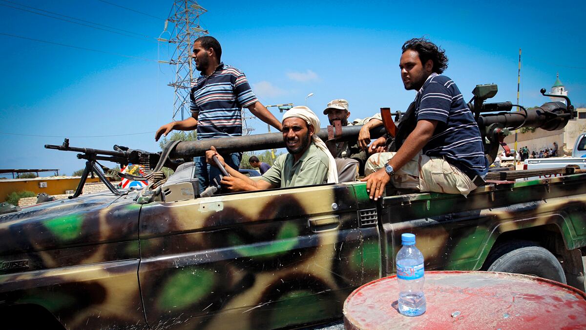 articles/2011/08/21/libya-s-muammar-gaddafi-and-tripoli-could-fall-soon-what-next/libya-rebels-babak_iftwaa