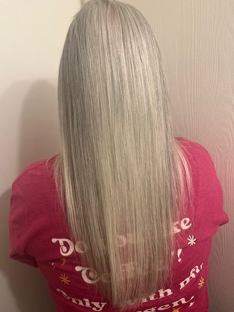 Amelia's gray hair from the back.