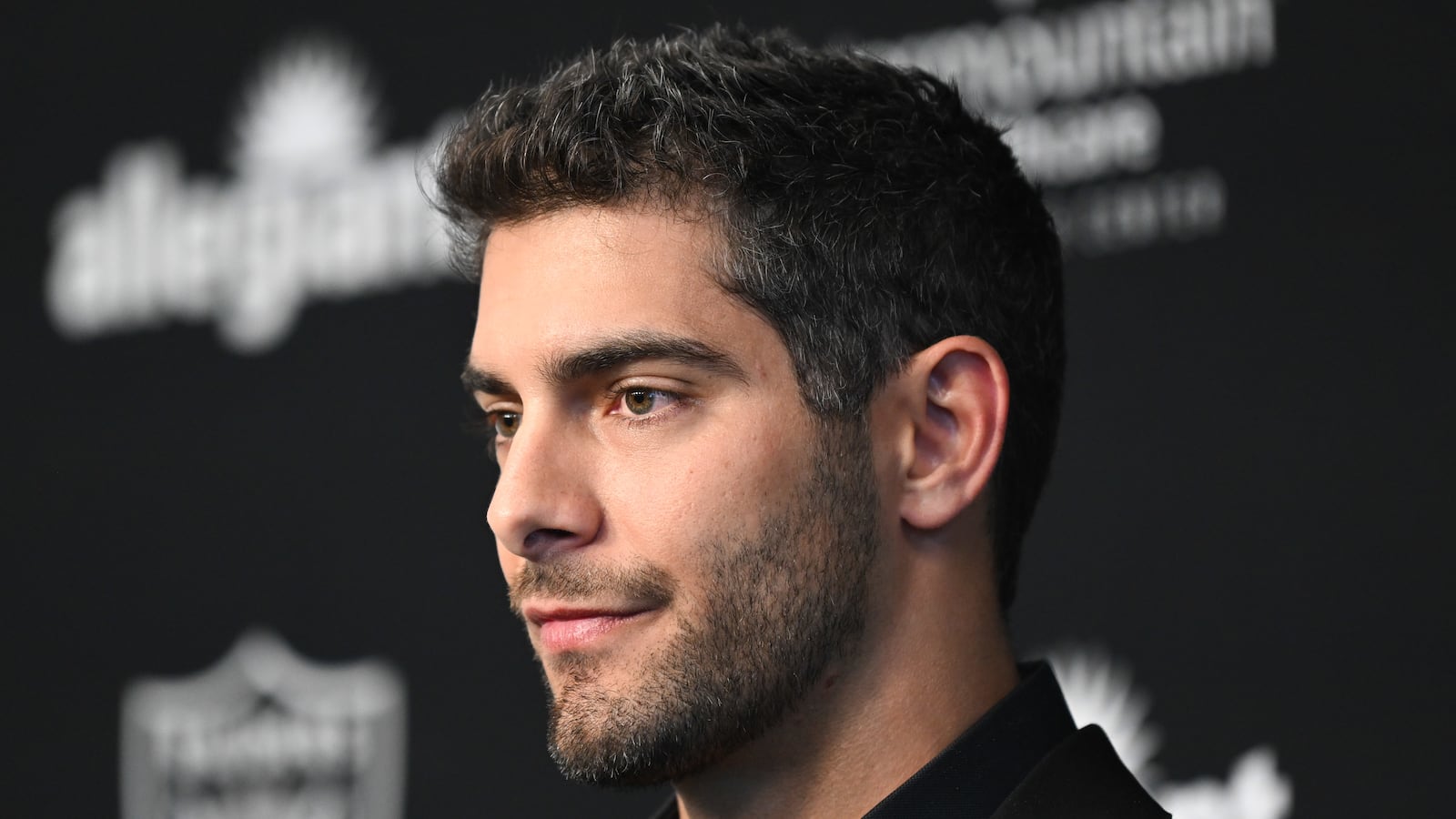 Jimmy Garoppolo stares forward during a press conference in Las Vegas.