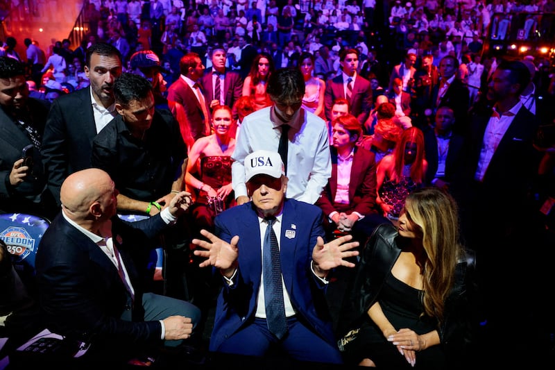 U.S. President Donald Trump gestures as he attends UFC Freedom 250 on the South Lawn of the White House in Washington, D.C., U.S., June 15, 2026. REUTERS/Evan Vucci     TPX IMAGES OF THE DAY