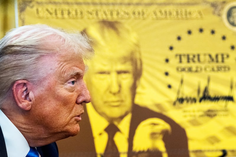 WASHINGTON, DC September 19: US President Donald Trump during the signing executive orders in the Oval Office at the White House on Friday September 19, 2025. President Trump signed a two executive orders establishing the "Trump Gold Card" and introducing a $100,000 fee for H-1B visas. The "Trump Gold Card" is a visa program that allows foreign nationals permanent residency and a pathway to U.S. citizenship. (Photo by Demetrius Freeman/The Washington Post via Getty Images)