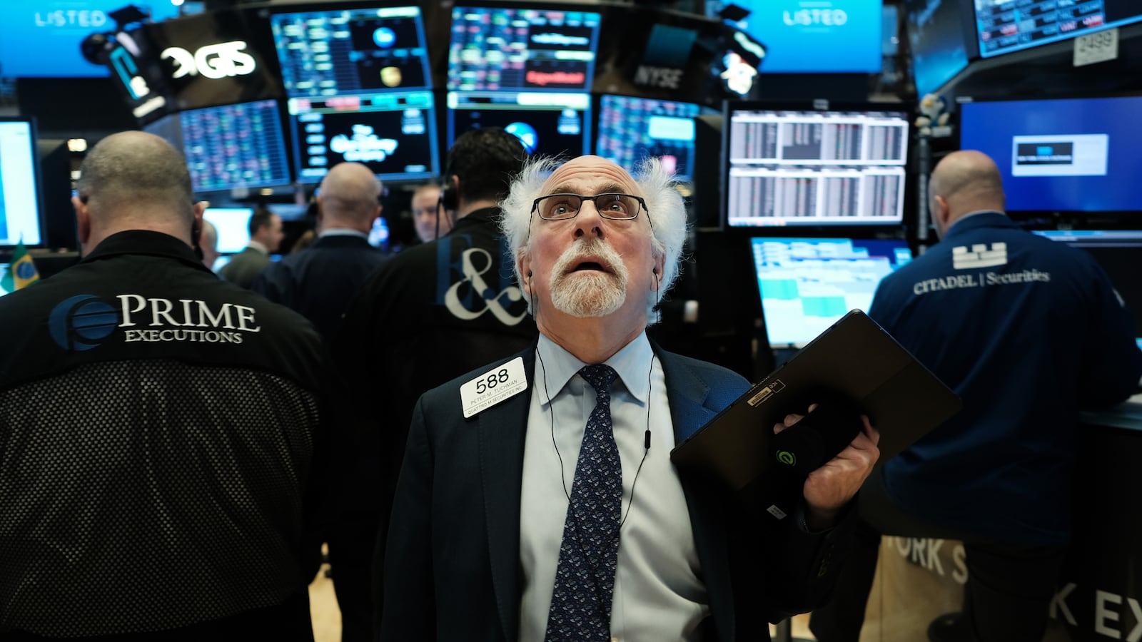 NEW YORK, NEW YORK - MARCH 09: Stock trader Peter Tuchman works on the floor of the New York Stock Exchange (NYSE) on March 09, 2020 in New York City. As global fears from the coronavirus continue to escalate, trading was halted for 15 minutes after the opening bell as stocks fell 7 percent. (Photo by Spencer Platt/Getty Images)