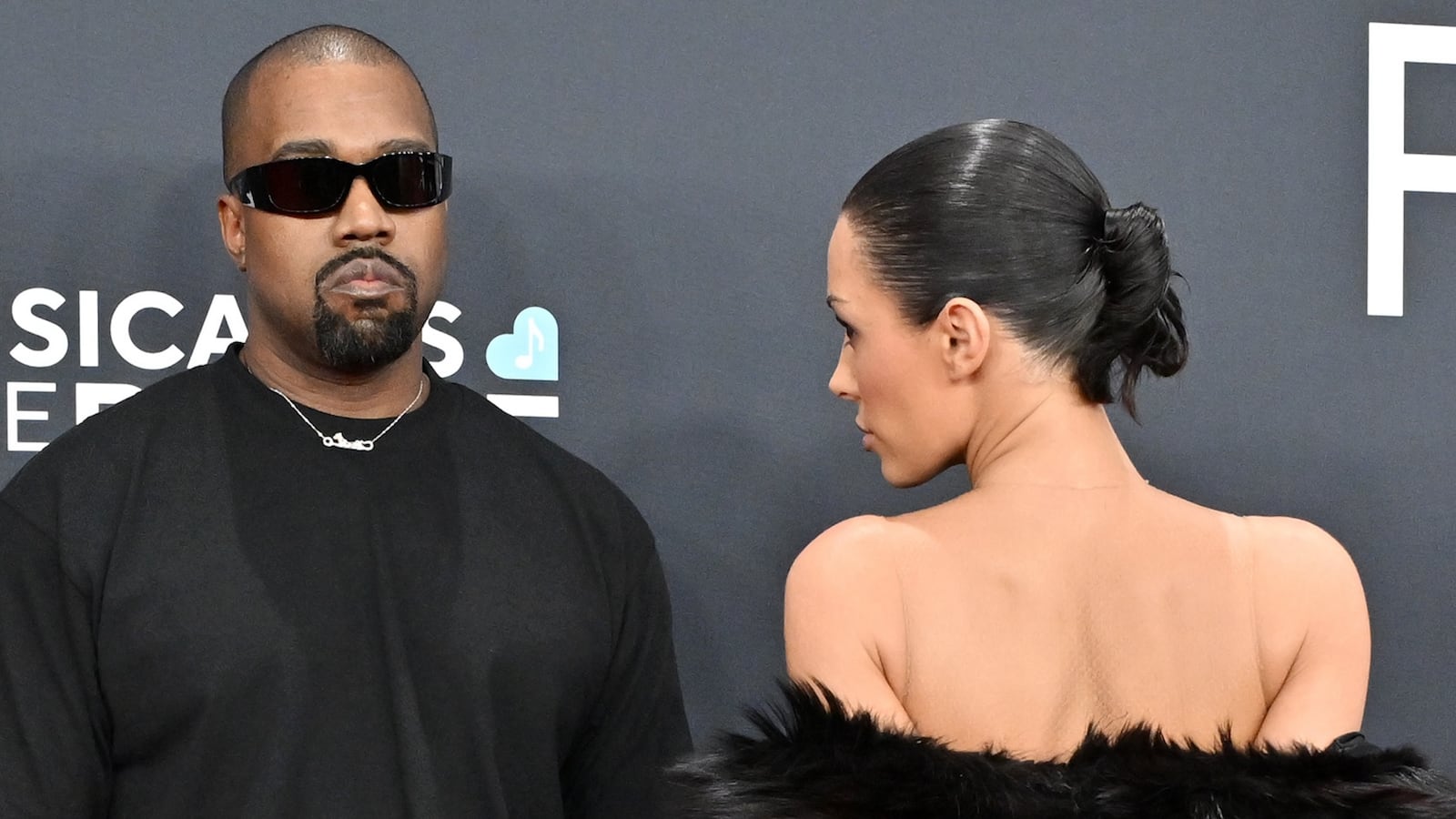 LOS ANGELES, CALIFORNIA - FEBRUARY 02: (FOR EDITORIAL USE ONLY) (EDITOR'S NOTE: Image contains nudity) Kanye West and Bianca Censori attend the 67th GRAMMY Awards at Crypto.com Arena on February 02, 2025 in Los Angeles, California. (Photo by Axelle/Bauer-Griffin/FilmMagic)