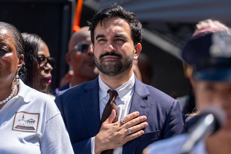 New York City Mayor Zohran Kwame Mamdani holds his hand over his heart during the national anthem at the National Night Out Against Crime in the confines of the 79 Precinct, in New York City, U.S., August 4, 2026. REUTERS/David Dee Delgado