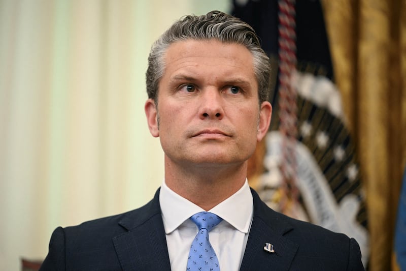 US Defense Secreatry Pete Hegseth looks on before President Donald Trump signs an executive order in the Oval Office of the White House in Washington, DC, on August 3, 2026. (Photo by Jim WATSON / AFP via Getty Images)