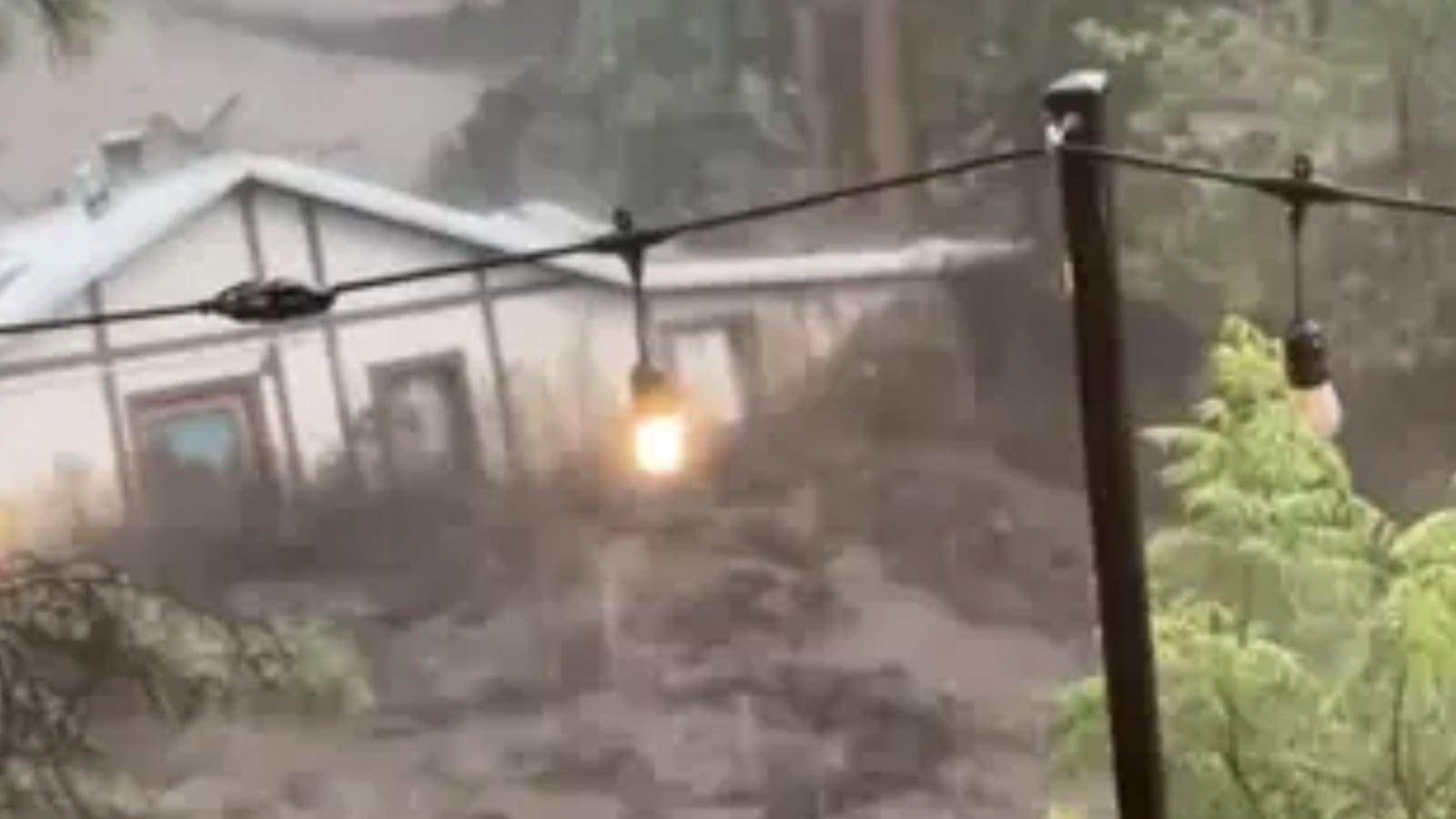 House swept by flood