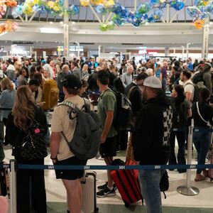 HOUSTON, TEXAS - NOVEMBER 7: People are shown in line in Terminal E at George Bush Intercontinental Airport in Houston Friday, Nov. 7, 2025. (Melissa Phillip/Houston Chronicle via Getty Images)