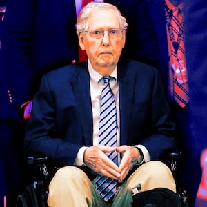 Sen. Mitch McConnell (R-KY) is pushed in a wheelchair as he heads for votes at the Capitol on February 18, 2025 in Washington, DC.