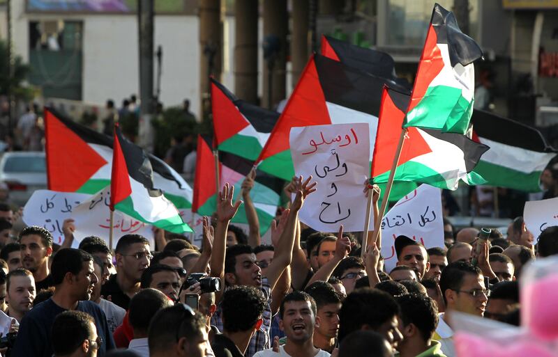 articles/2013/09/16/the-oslo-accords-have-served-u-s-and-israeli-interests-but-not-palestine-s/OZ_Palestinians_protest_Oslo_Accords_bpyjqr