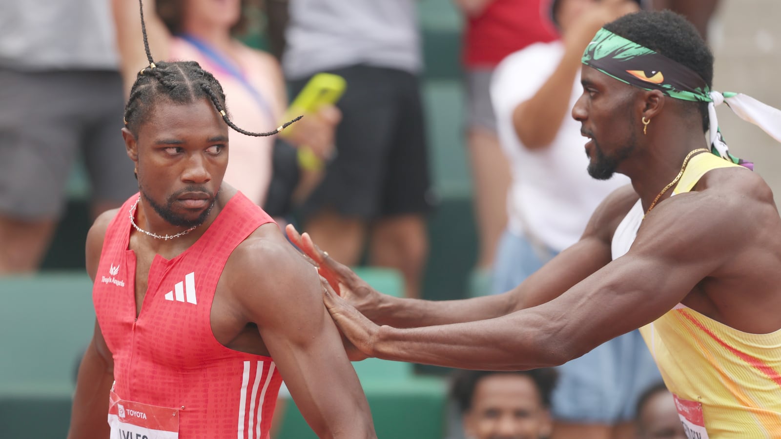 Noah Lyles is pushed by Kenny Bednarek following the Men's 200m final during the 2025 USATF Outdoor Championships at Hayward Field on August 03, 2025 in Eugene, Oregon.