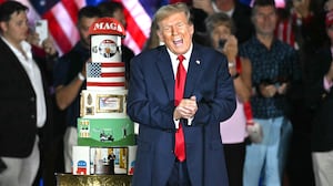 Donald Trump gestures by his birthday cake, created by Club 47, during a campaign rally as he celebrates his 78th birthday at West Palm Convention Center, in West Palm Beach, Florida, on June 14, 2024.