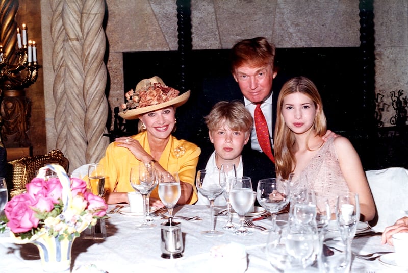 Family portrait of Ivana Trump, Eric Trump, Donald Trump, and Ivanka Trump at Mar-a-Lago in 1998.