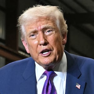 US President Donald Trump gestures at the end of his speech after touring the Coosa Steel Corporation factory in Rome, Georgia, February 19, 2026. (Photo by SAUL LOEB / AFP via Getty Images)