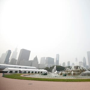 Smokes from the Canadian wildfires lingers over the Chicago skyline, with air quality alerts in 20 states.