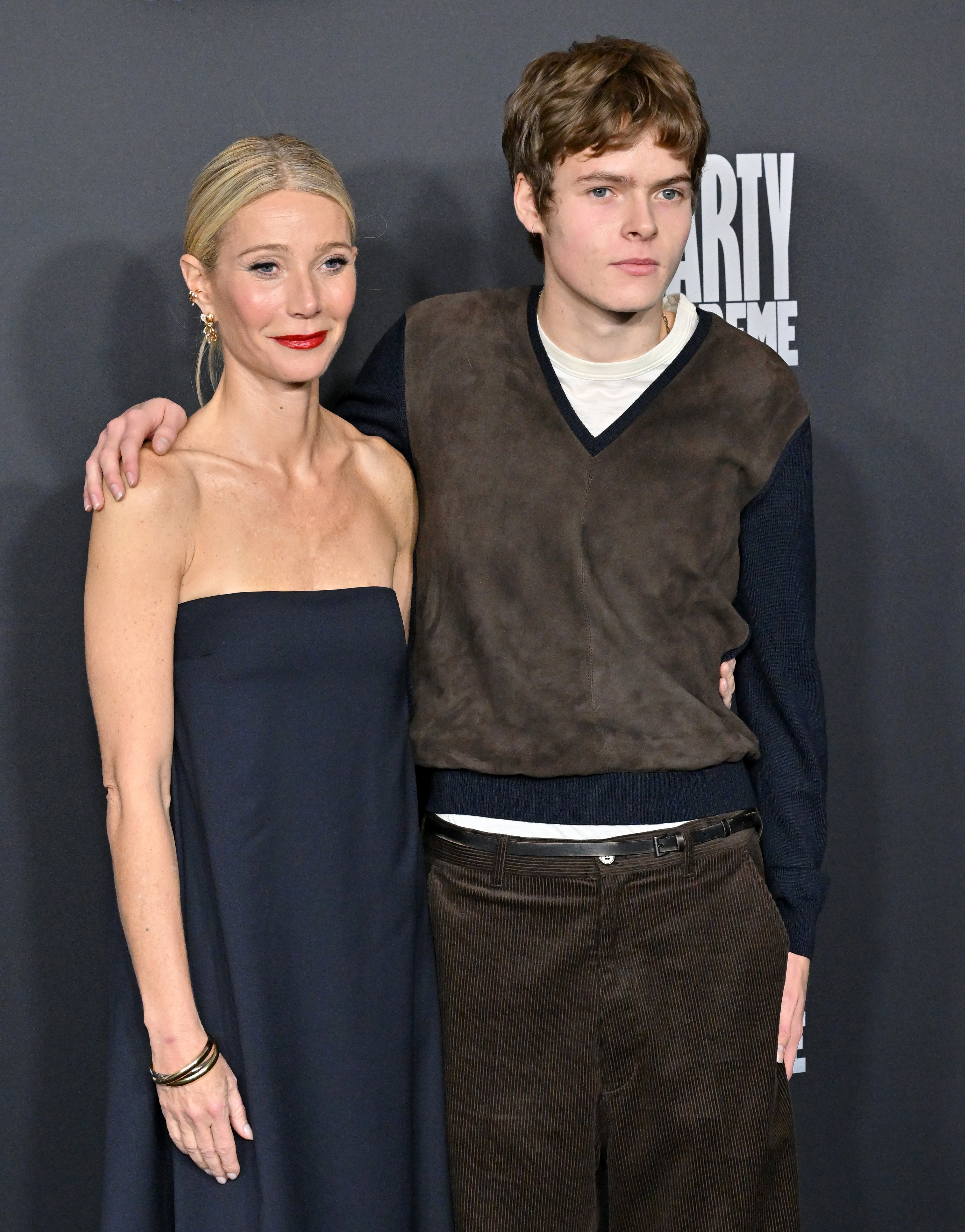 Gwyneth Paltrow and Moses Martin at the Marty Supreme premiere on December 08, 2025.