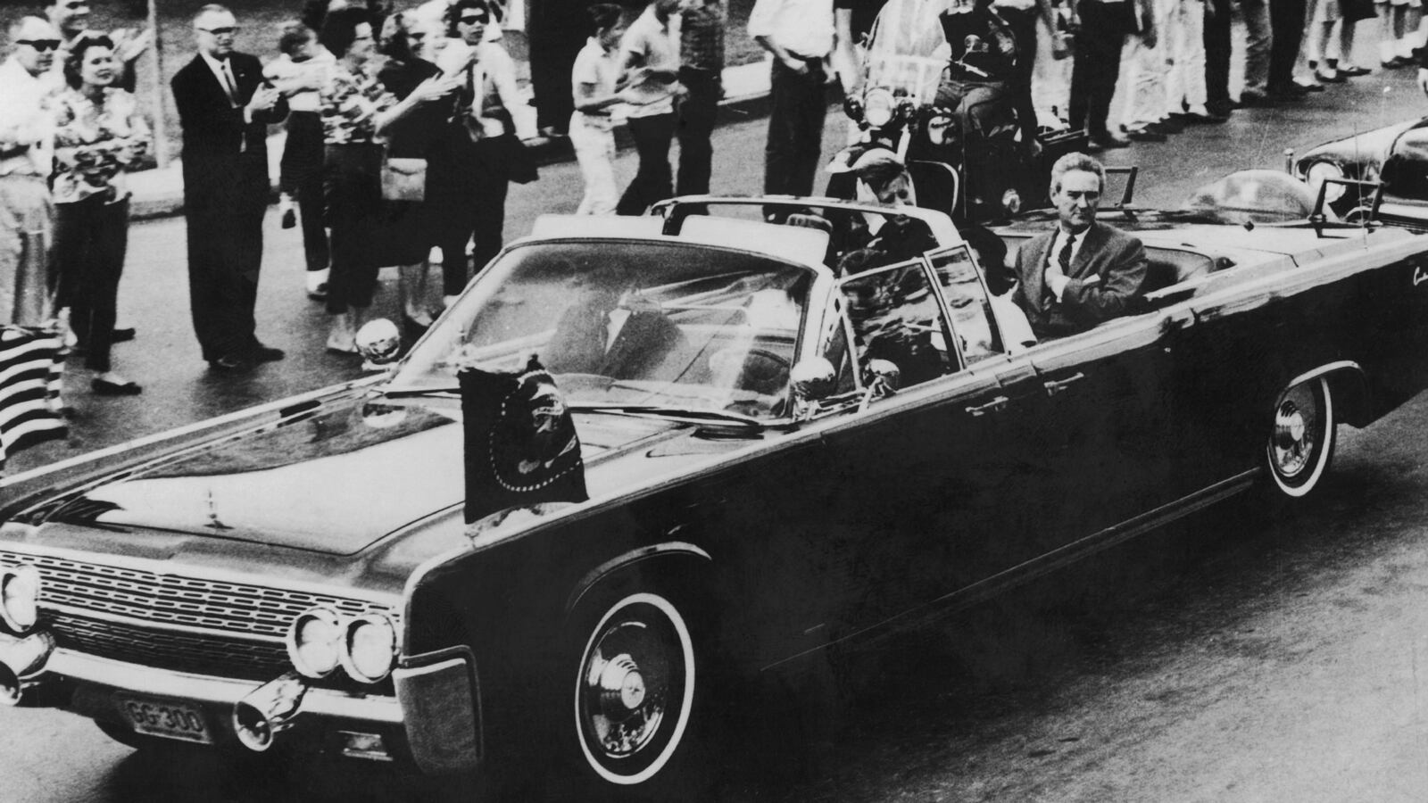 The Presidential motorcade with Texas governor John Connally, first lady Jackie Kennedy and President John F. Kennedy on November 21, 1963.