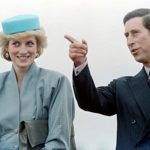 Prince Charles points out something in the crowd to Diana, Princess of Wales, during a walkabout in Nanaimo, British Columbia, Canada, on May 1, 1986, as part of a royal tour of British Columbia.