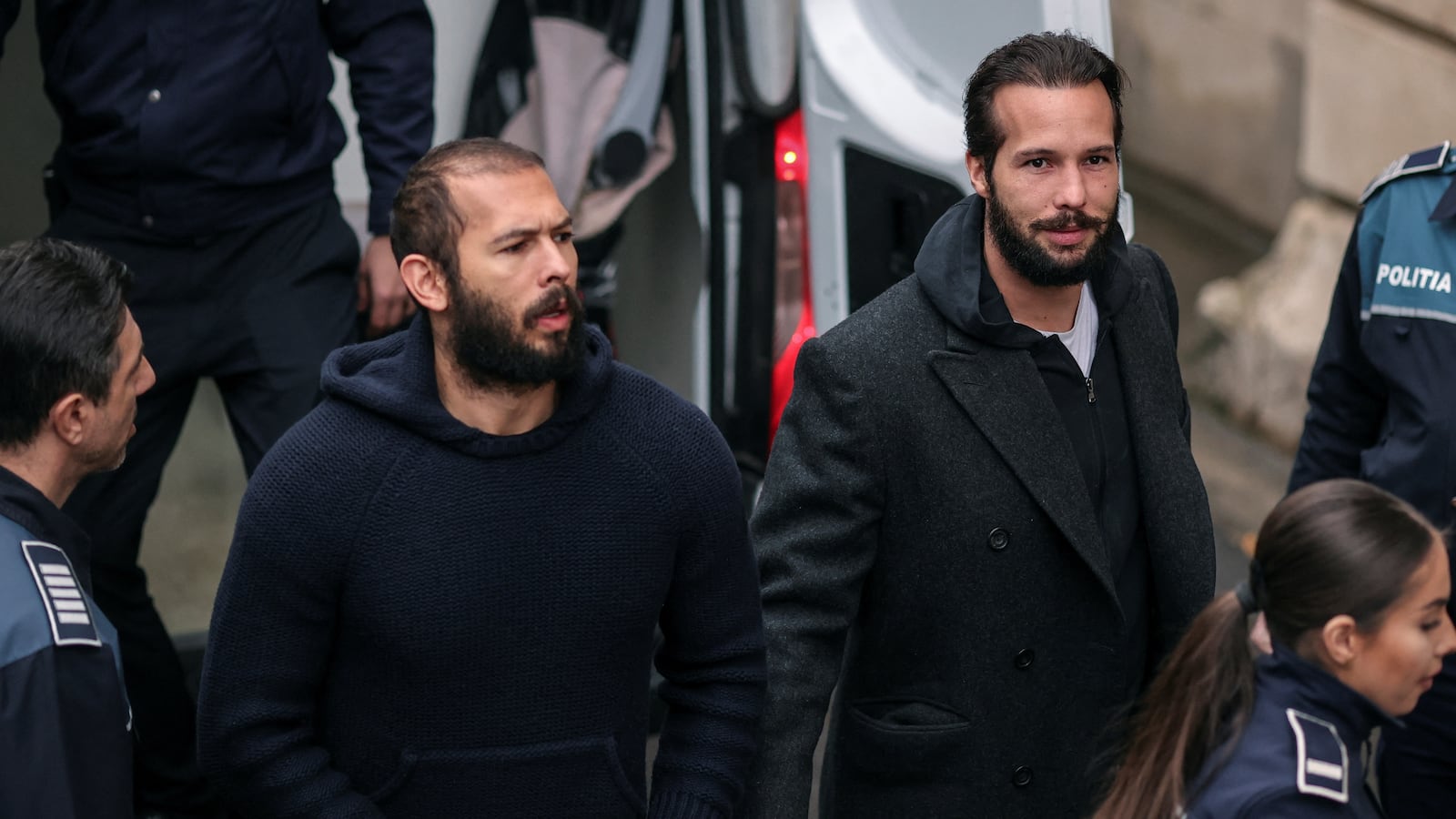 Andrew Tate and his associates were released from a Romanian prison on Friday and placed under house arrest.