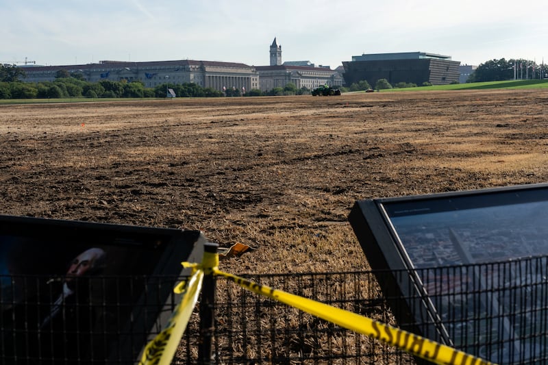 A worker mows a patch of grass where "8647" was etched into the National Mall, in Washington, D.C., U.S., September 8, 2026. REUTERS/Eric Lee