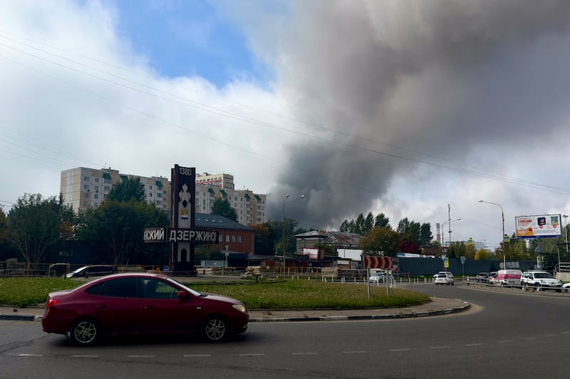 Smoke rises from the area of the Russian oil producer Gazprom Neft's Moscow oil refinery as seen from Dzerzhinsky in the Moscow region on September 20, 2026. Hundreds of drones targeting Moscow and its surrounding region killed at least two people and damaged a major refinery on the final day of the country's parliamentary elections, the authorities said on September 20, 2026. (Photo by AFP via Getty Images)