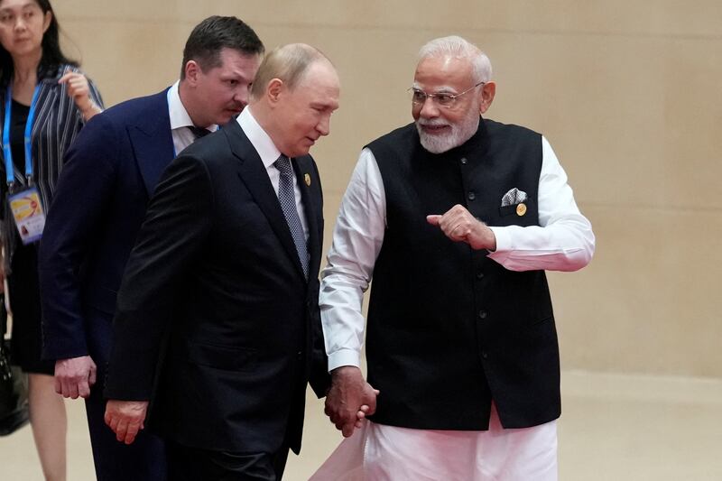 Indian Prime Minister Narendra Modi and Russian President Vladimir Putin held hands at a recent summit of anti-Western coalition leaders in China.
