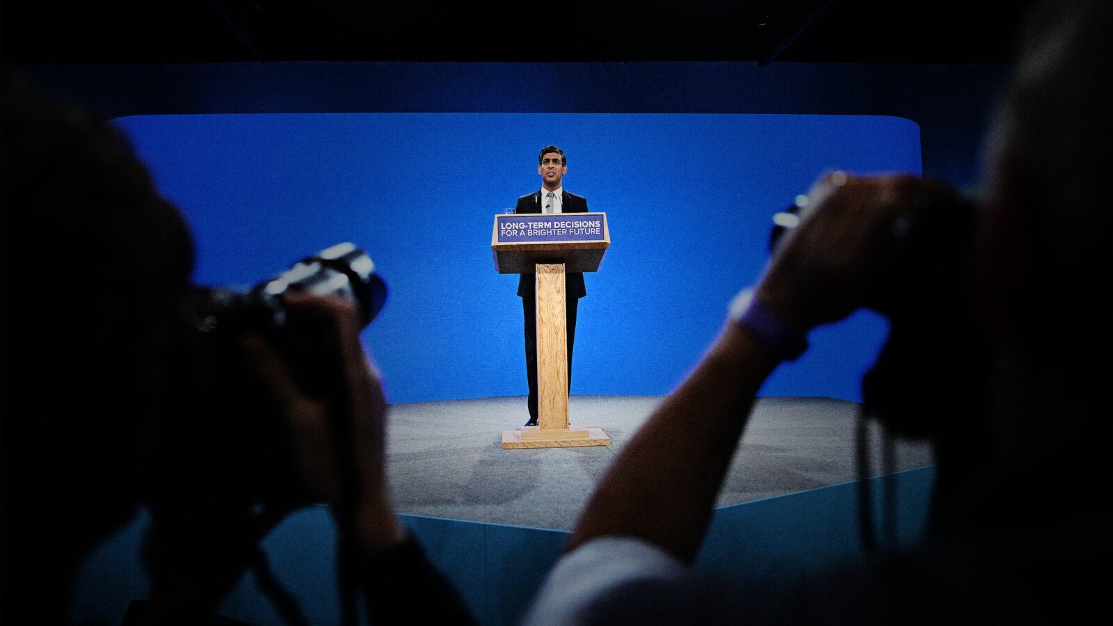 Britain's Prime Minister Rishi Sunak addresses delegates at the annual Conservative Party Conference in Manchester on October 4, 2023.