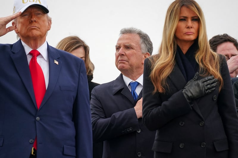 U.S. Special Envoy Steve Witkoff stands behind President Donald Trump and first lady Melania Trump during the transfer of the remains of six U.S. Army service members who were killed in Kuwait.