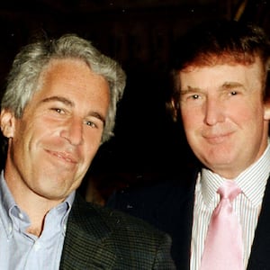 Portrait of American financier Jeffrey Epstein (left) and real estate developer Donald Trump as they pose together at the Mar-a-Lago estate, Palm Beach, Florida on February 22, 1997. (Photo by Davidoff Studios/Getty Images)