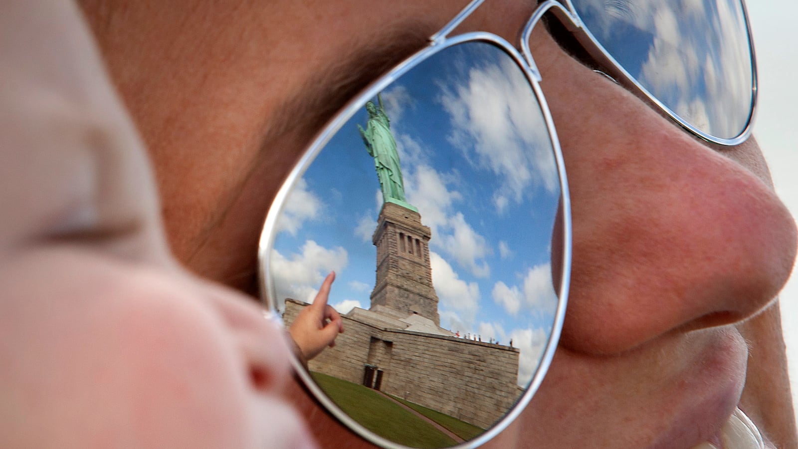 articles/2014/10/28/128-years-old-and-still-a-looker-happy-birthday-to-lady-liberty/141027-mitchell-liberty-tease_a24afs