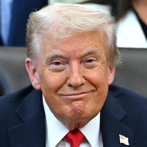 US President Donald Trump smiles during an announcement in the Oval Office of the White House in Washington, DC, on October 16, 2025. (Photo by ANDREW CABALLERO-REYNOLDS / AFP) (Photo by ANDREW CABALLERO-REYNOLDS/AFP via Getty Images)